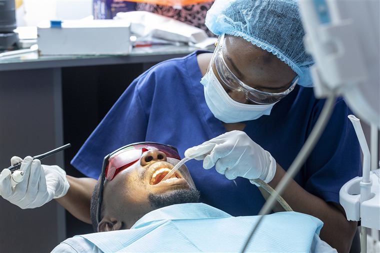 A dentist treating a patient